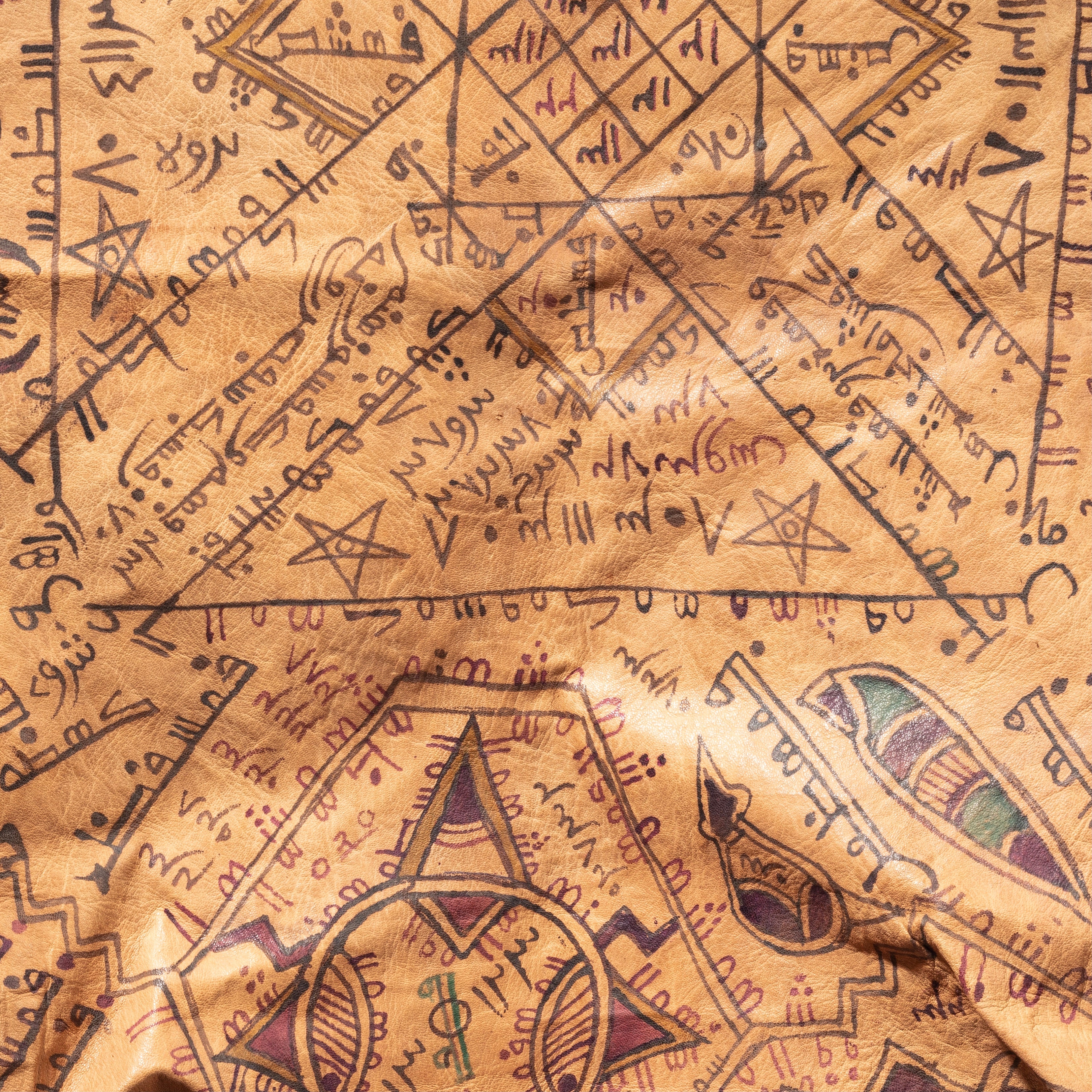 A MAGIC SQUARE WITH SCRIPT +DIAGRAMS ON LEATHER  HAUSA TRIBE OF NIGERIA (No 1823)