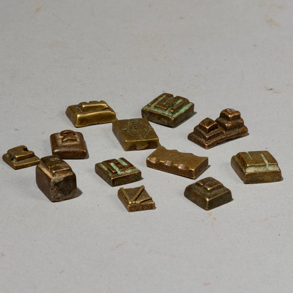 A GEOMETRIC GROUP OF 12 GOLD MEASURING WEIGHTS FROM BAULE TRIBE IVORY COAST W.AFRICA( No 2018)