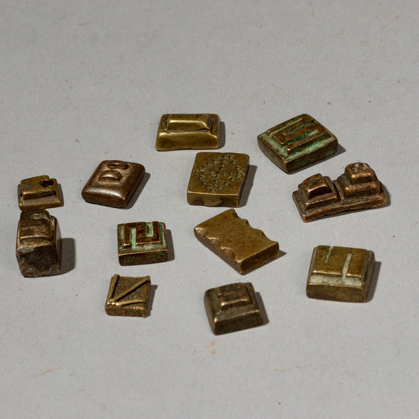 A GEOMETRIC GROUP OF 12 GOLD MEASURING WEIGHTS FROM BAULE TRIBE IVORY COAST W.AFRICA( No 2018)