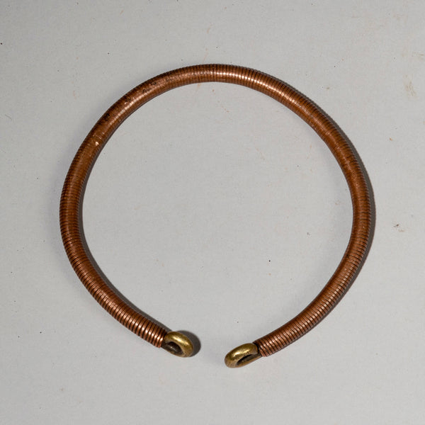 AN ANTIQUE COPPER + BRASS TORQUE FROM ETHIOPIA( No 2136)