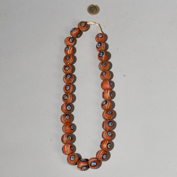 A RED, BLUE + WHITE SOLID GLASS NECKLACE FROM JAVA SE ASIA ( No 2099)