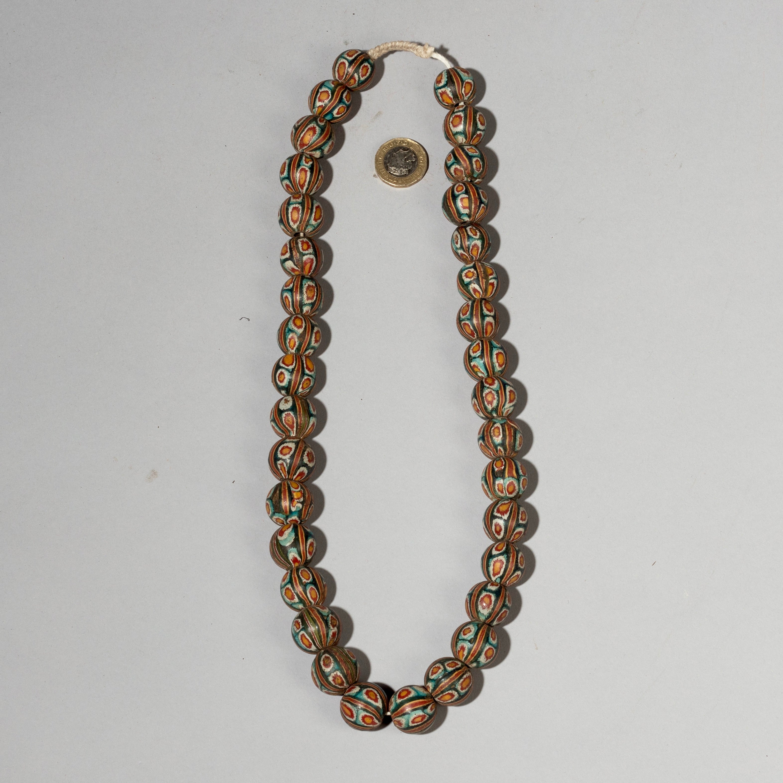 A GREEN, RED, YELLOW + WHITE SOLID GLASS NECKLACE FROM JAVA( No 2098)
