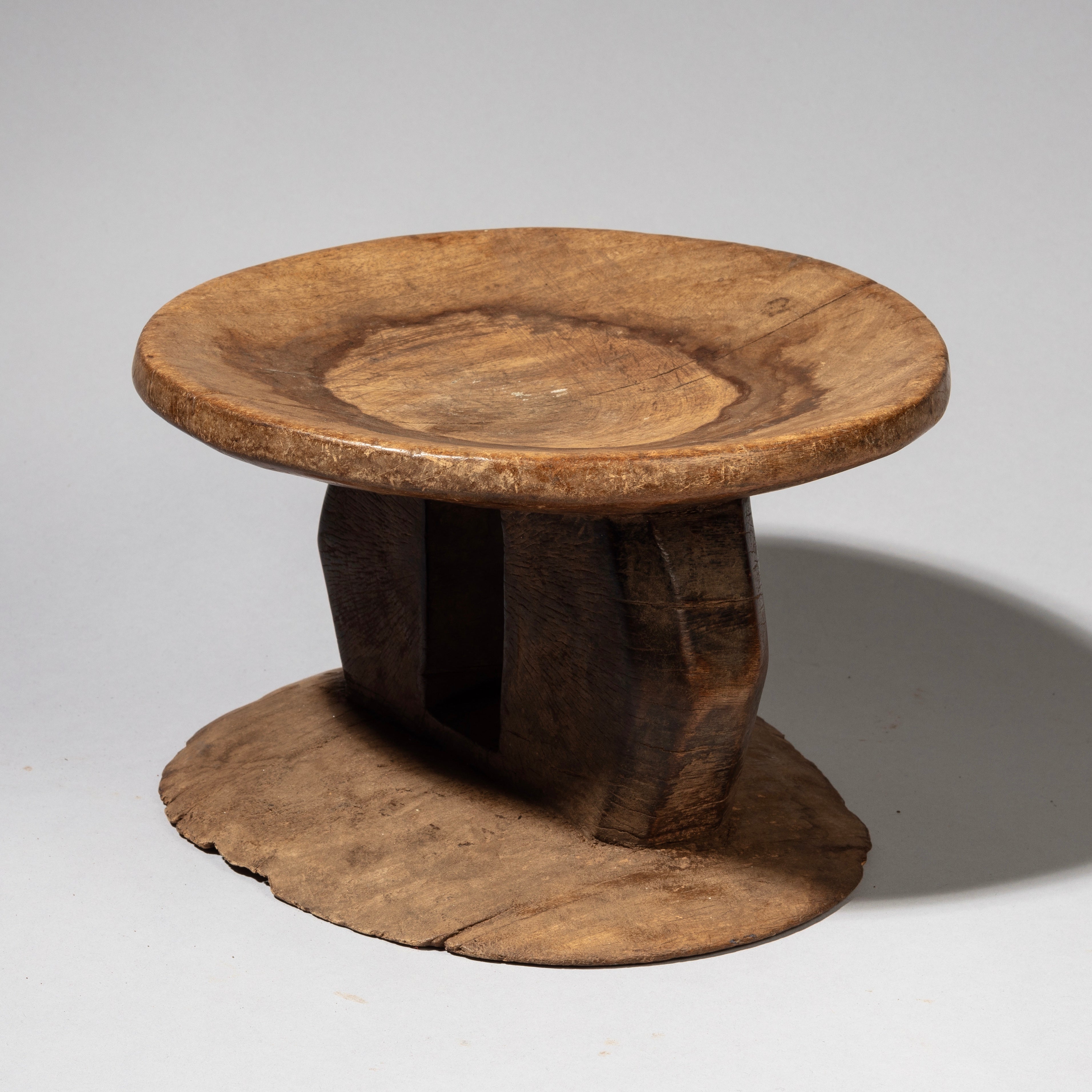 A SMALL +SIMPLE STOOL WITH BUILT HANDLE FROM POKOT TRIBE KENYA( No 2195)