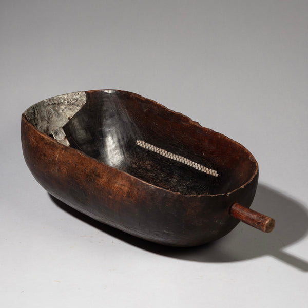 A GENEROUS WOODEN BOWL WITH METAL INDIGENOUS REPAIRS FROM THE TUTSI TRIBE OF RWANDA ( No 2197)