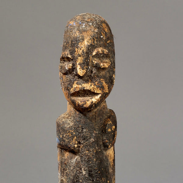 A DEEPLY ENCRUSTED LOBI THIL STATUE WITH UNUSUAL FEATURES ( No 294)