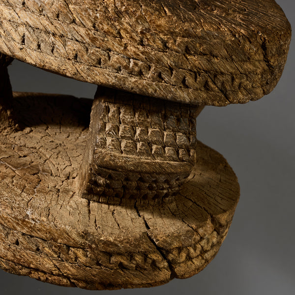 A MINATURE GEOMETRIC,SMALL  ENGRAVED STOOL FROM DOGON TRIBE OF MALI W.AFRICA ( No 5198)