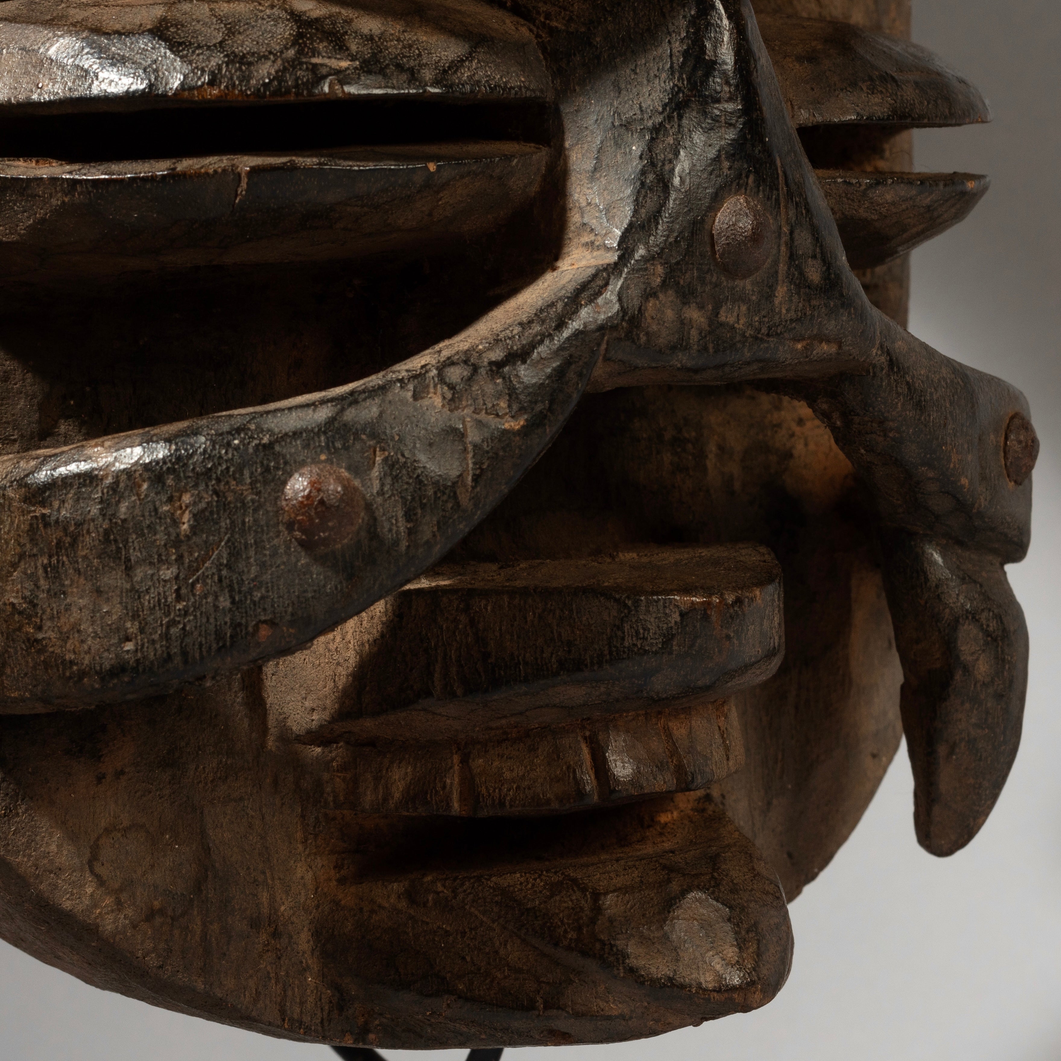 A DRAMATIC STUD ENCRUSTED BETE TRIBE MASK FROM IVORY COAST ( No 2921 )