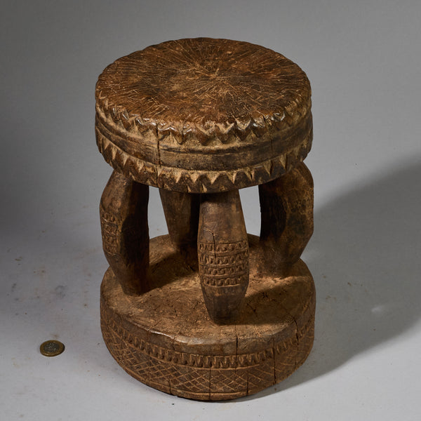 A SOLID GEOMETRIC  MEDIUM STOOL FROM THE DOGON TRIBE OF MALI WEST AFRICA( No 6258 )