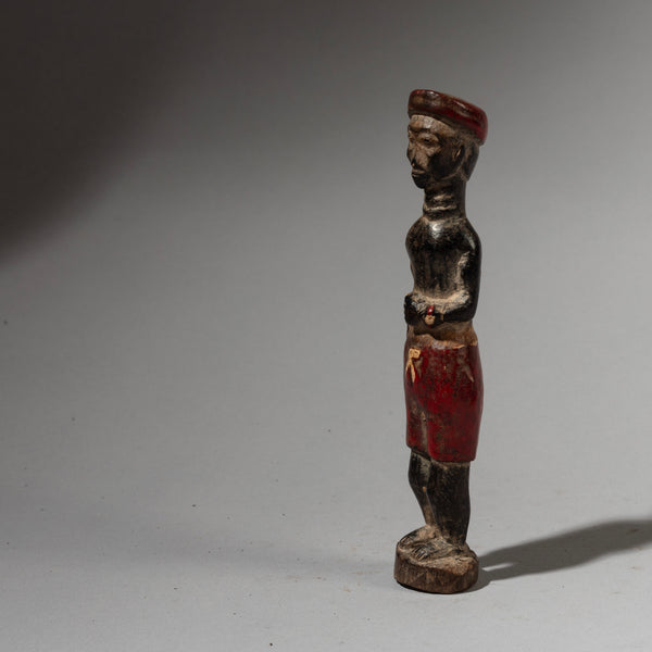 A DEMURE COLON FIGURE FROM THE BAULE PEOPLE OF THE IVORY COAST W.AFRICA ( No 2893 )