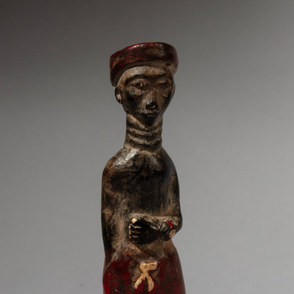 A DEMURE COLON FIGURE FROM THE BAULE PEOPLE OF THE IVORY COAST W.AFRICA ( No 2893 )