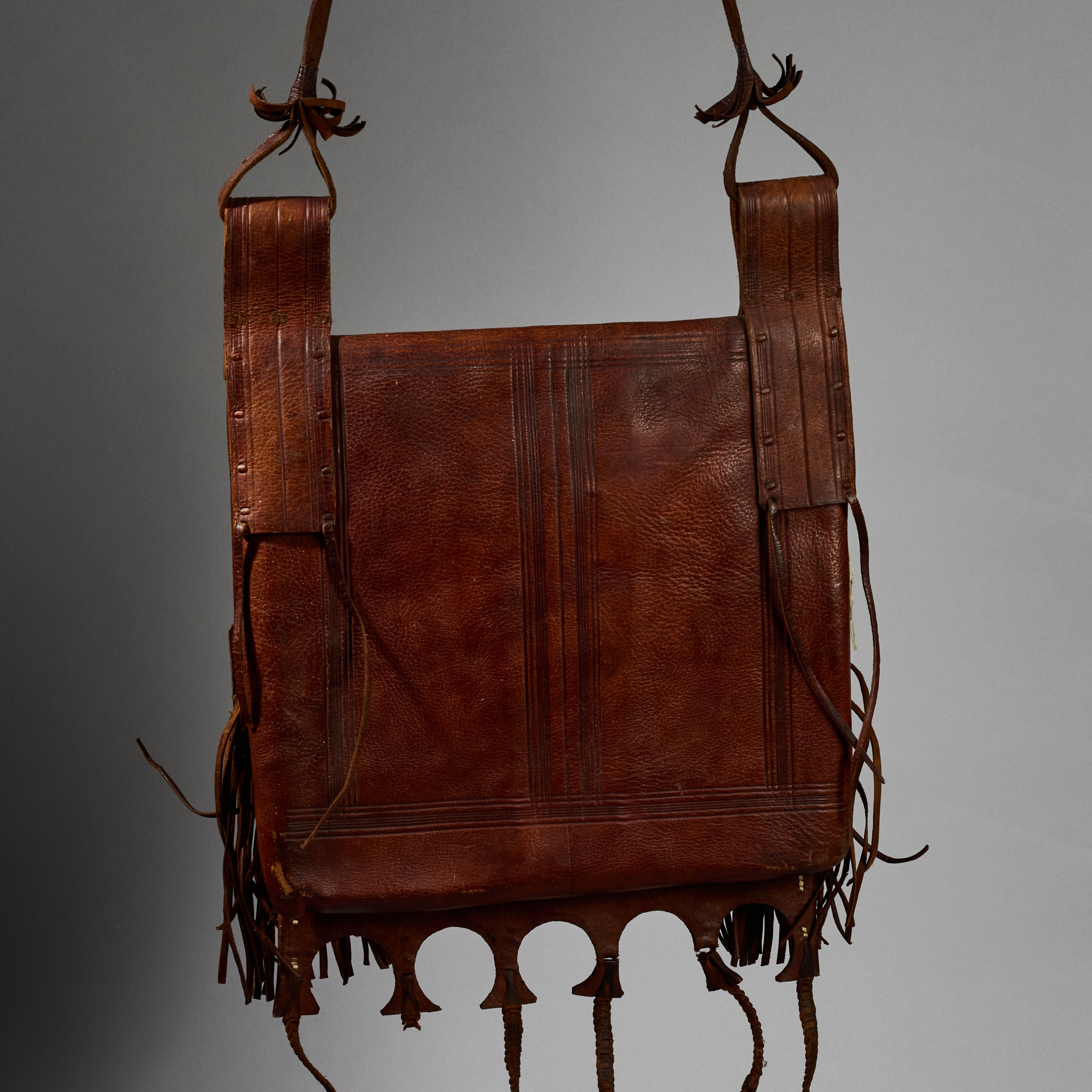A OLD LEATHER BAG WITH MAGICAL DECORATION, HAUSA TRIBE OF NIGERIA ( No 6287)