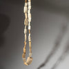 A LONG “HIPPO TOOTH” SHELL CURRENCY NECKLACE FROM WEST AFRICA  ( No 2925 )