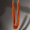 AN ORANGE  MULTISTRAND GLASS NECKLACE, BAULE TRIBE IVORY COAST ( No 2910 )