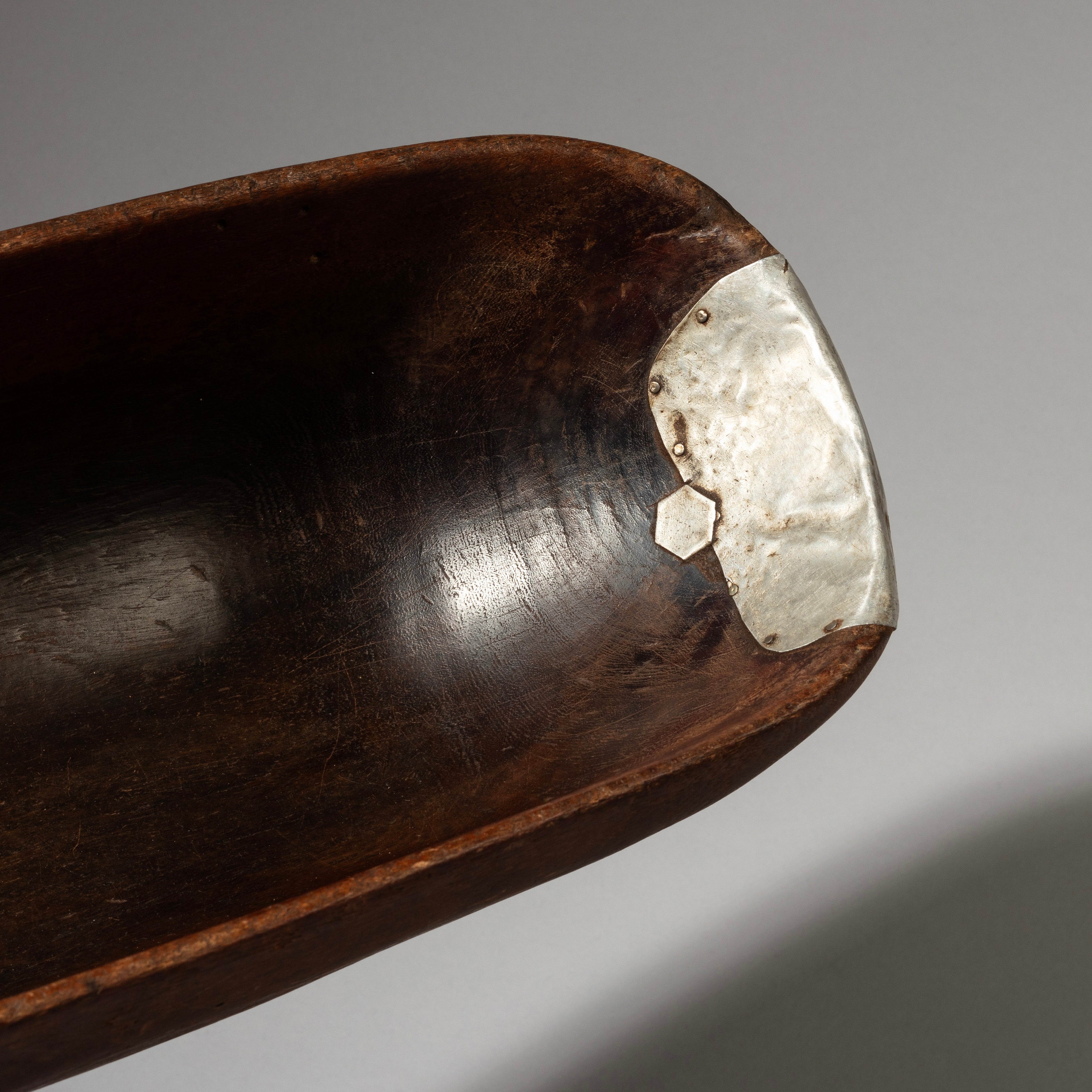 A DEEP WOODEN BOWL WITH METAL INDIGENOUS REPAIRS FROM THE TUTSI TRIBE OF RWANDA ( No 2866 )