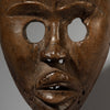 A SMOOTHLY  PATINATED  DAN MASK FROM THE IVORY COAST ( No 2961 )