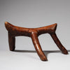 A WARMLY PATINATED 3 LEGGED HEADREST FROM KENYA ( No 2226)