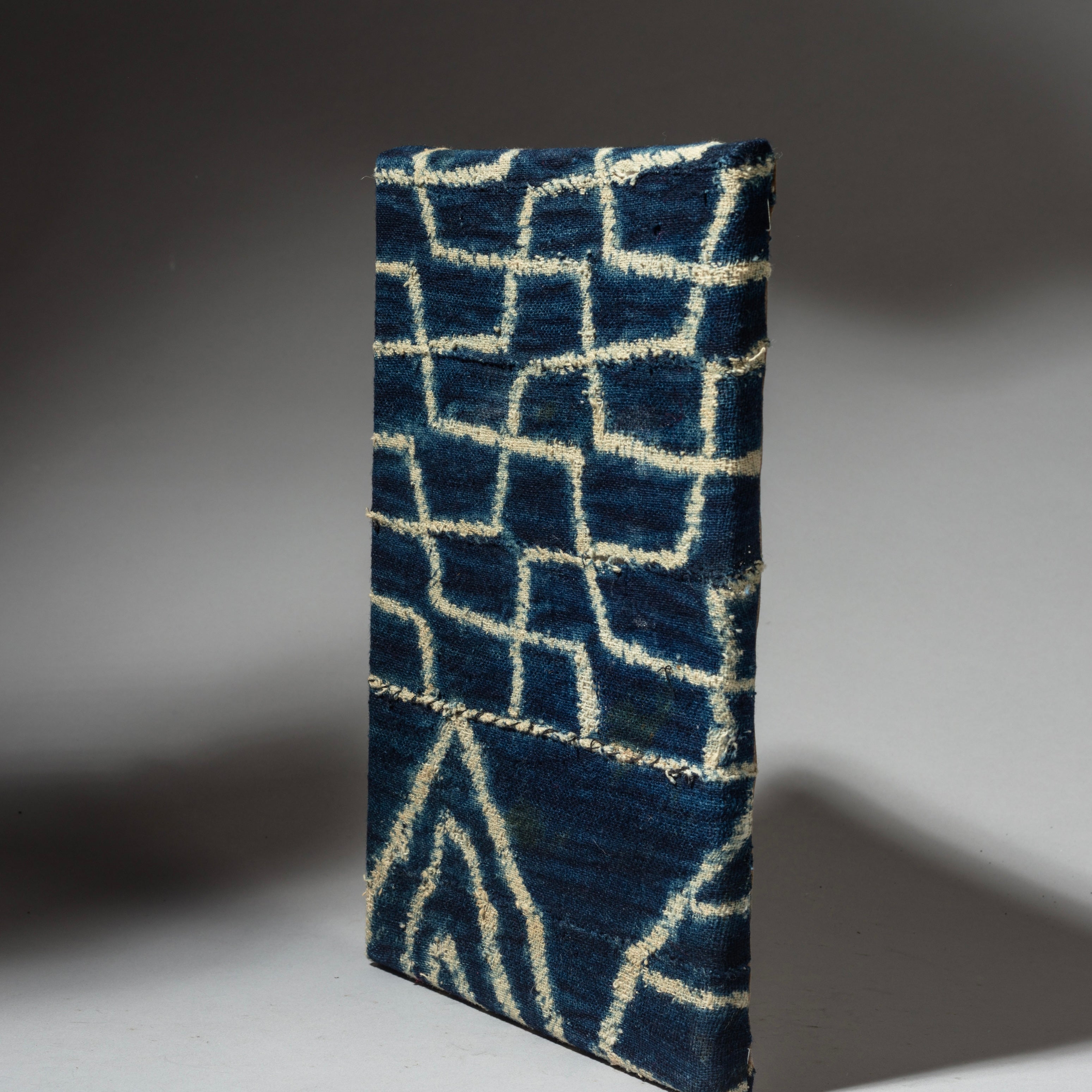 A PRETTY MOUNTED NDOP CLOTH FRAGMENT, BAMILEKE TRIBE OF NIGERIA W.AFRICA ( No 4056 )