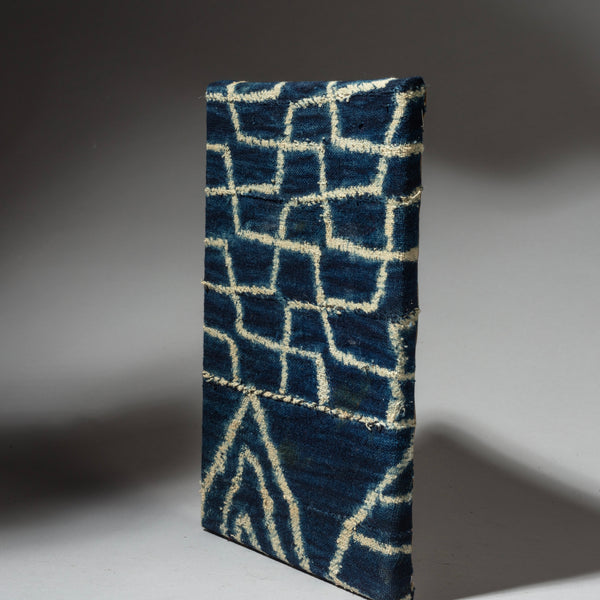 A PRETTY MOUNTED NDOP CLOTH FRAGMENT, BAMILEKE TRIBE OF NIGERIA W.AFRICA ( No 4056 )