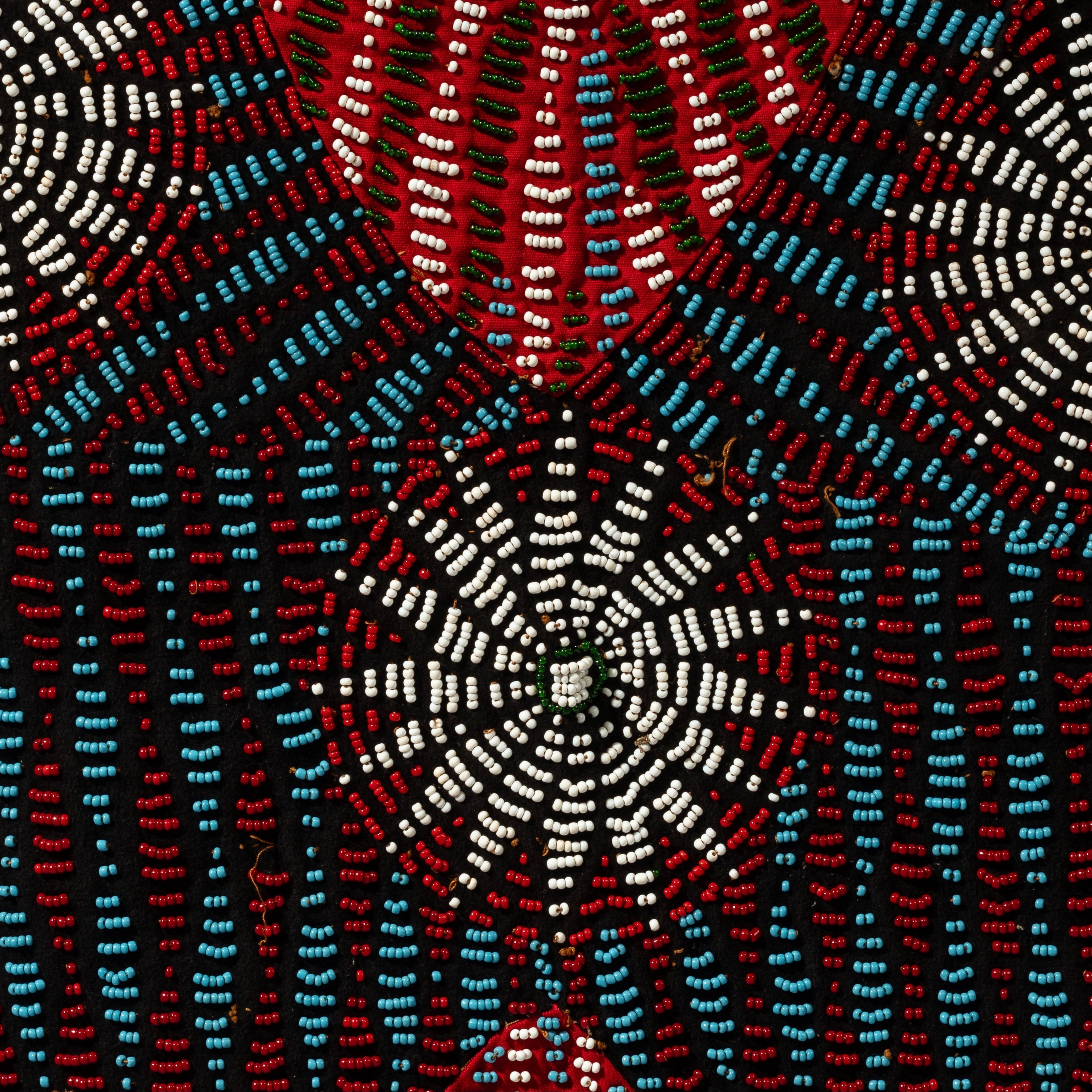 A BEADED TOP WITH CELESTIAL PATTERNS  FROM THE BAMILEKE TRIBE OF CAMEROON W.AFRICA( No 2298)
