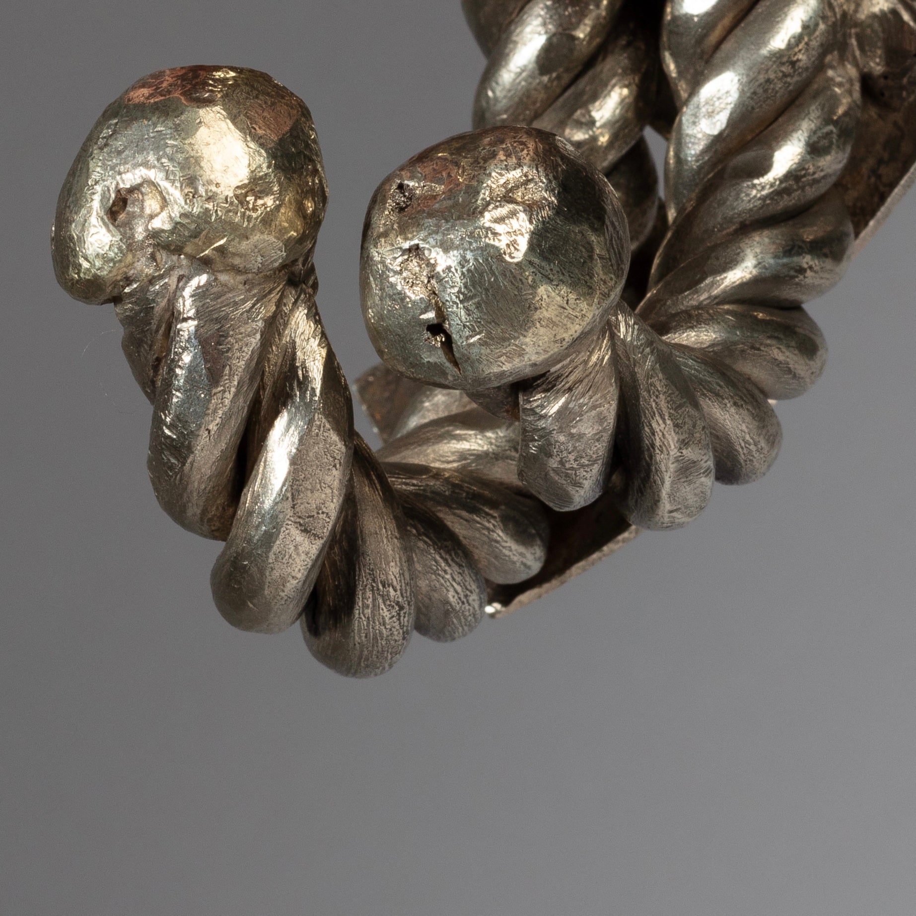 A TWISTED PAIR OF SILVER BRACELETS, TUAREG TRIBE FROM NIGER W.AFRICA( No 2317)