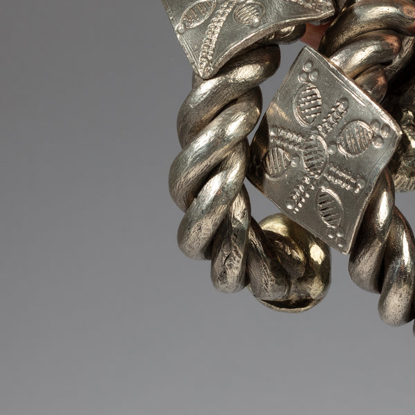 A TWISTED PAIR OF SILVER BRACELETS, TUAREG TRIBE FROM NIGER W.AFRICA( No 2317)