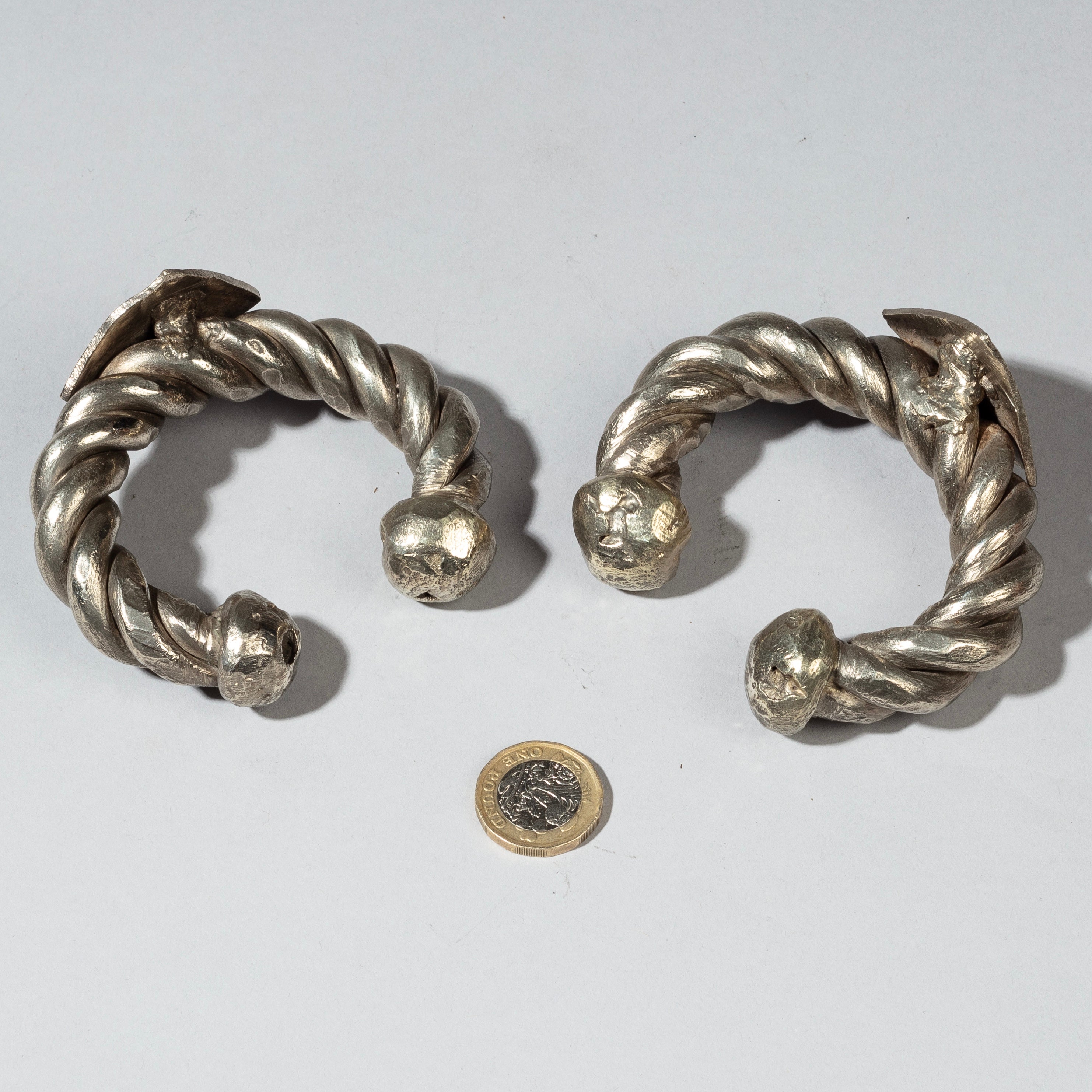 A TWISTED PAIR OF SILVER BRACELETS, TUAREG TRIBE FROM NIGER W.AFRICA( No 2317)