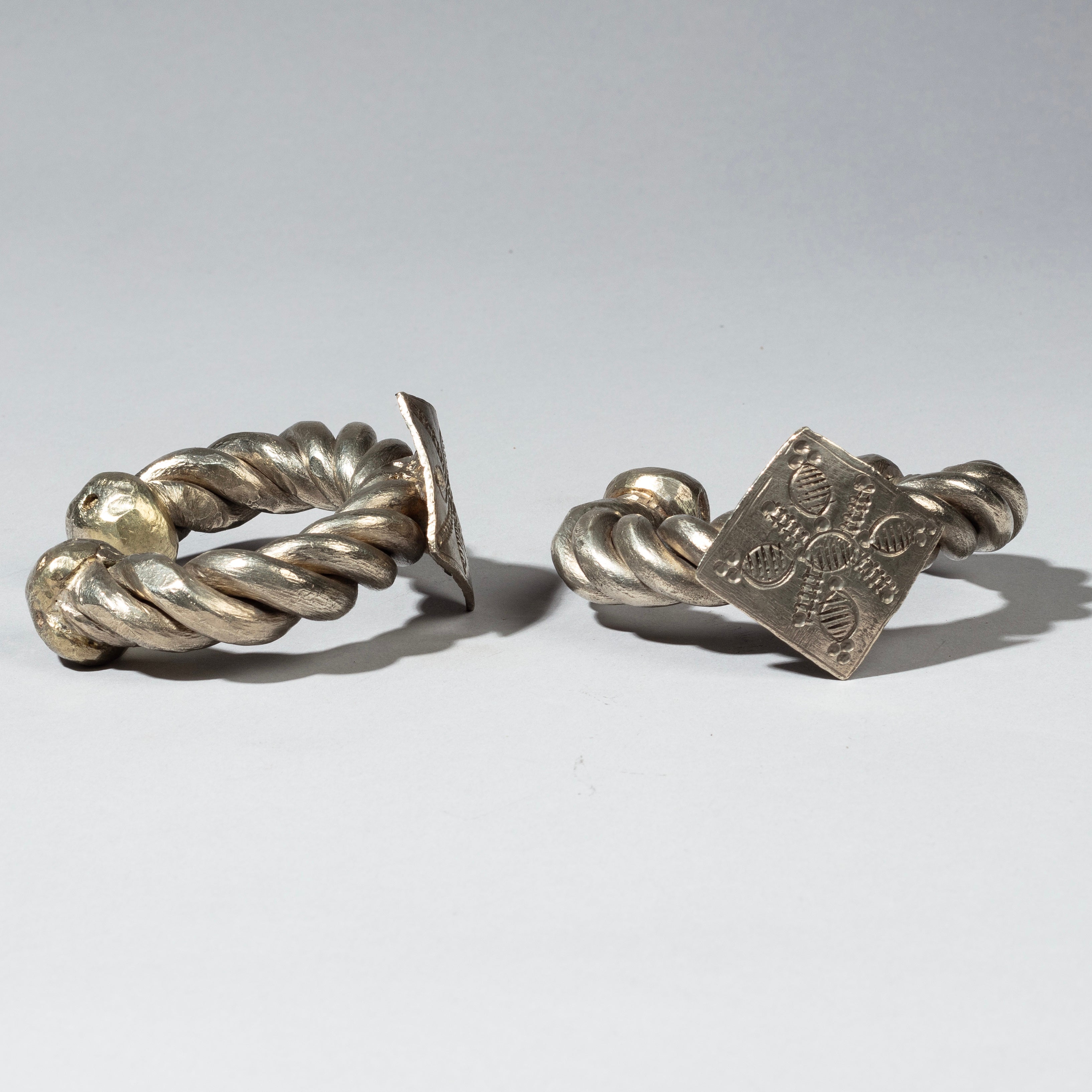 A TWISTED PAIR OF SILVER BRACELETS, TUAREG TRIBE FROM NIGER W.AFRICA( No 2317)