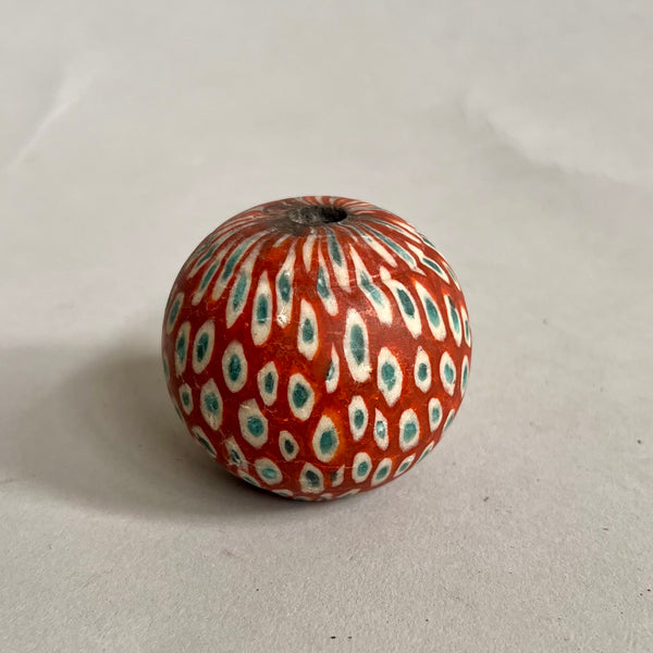 A BRICK RED BIG SPOTTED BEAD FROM INDONESIA ( No 2556)