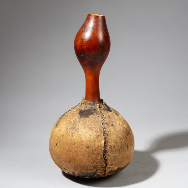 ( No 2359 ) A CHARACTERFUL GOURD WITH LEATHER, ETHIOPIA