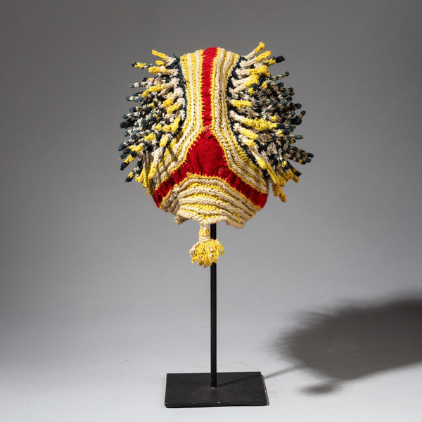 A RED BLUE, YELLOW +WHITE FINGERLING HAT FROM THE BAMILEKE TRIBE OF CAMEROON W.AFRICA( No 2316)