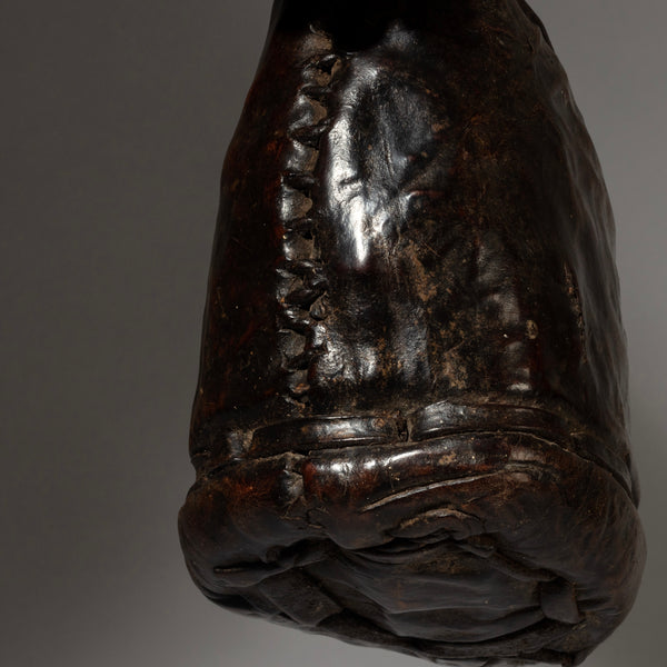 A LUSH  PATINATED ETHIOPIAN LEATHER HEADREST, WELL USED, GURAGE TRIBE, E AFRICA EX UK COLLECTION ( No 4150 )