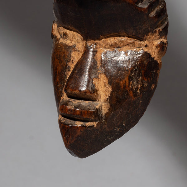 A DEEPLY PATINATED DAN PASSPORT MASK FROM THE IVORY COAST ex UK COLL ( No 2387)