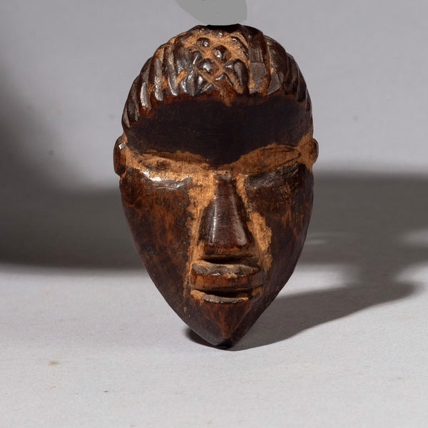 A DEEPLY PATINATED DAN PASSPORT MASK FROM THE IVORY COAST ex UK COLL ( No 2387)