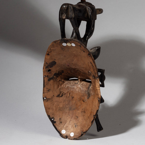 A ROMANTIC KPELIYE’E BIRD MASK WITH ELEPHANT, SENOUFO TRIBE OF THE IVORY COAST W.AFRICA( No 2382)