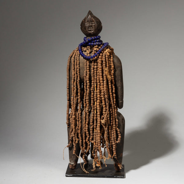 A BIG, METAL BEAD CLAD WOODEN DOLL, NAMJE TRIBE OF CAMEROON( No 2398)