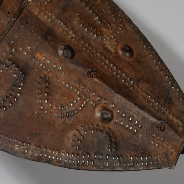 Sold AN EMBOSSED METAL SHIELD, DINKA TRIBE  E.AFRICA WITH GOOD AGE AND PATINA  ( No 4283 )