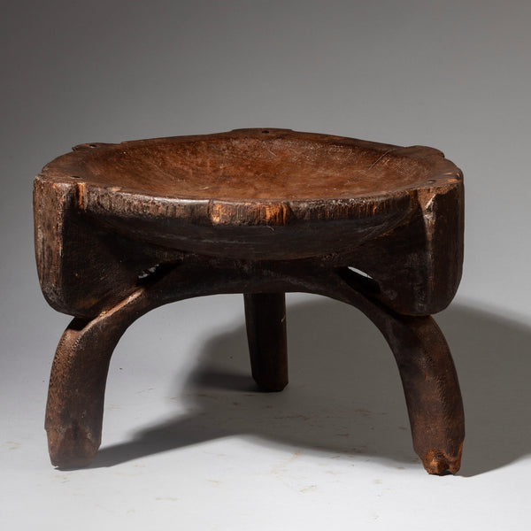 A MEDIUM SIZED OLD AND PRETTY STOOL FROM THE HE HE TRIBE TANZANIA ( No 4272 )