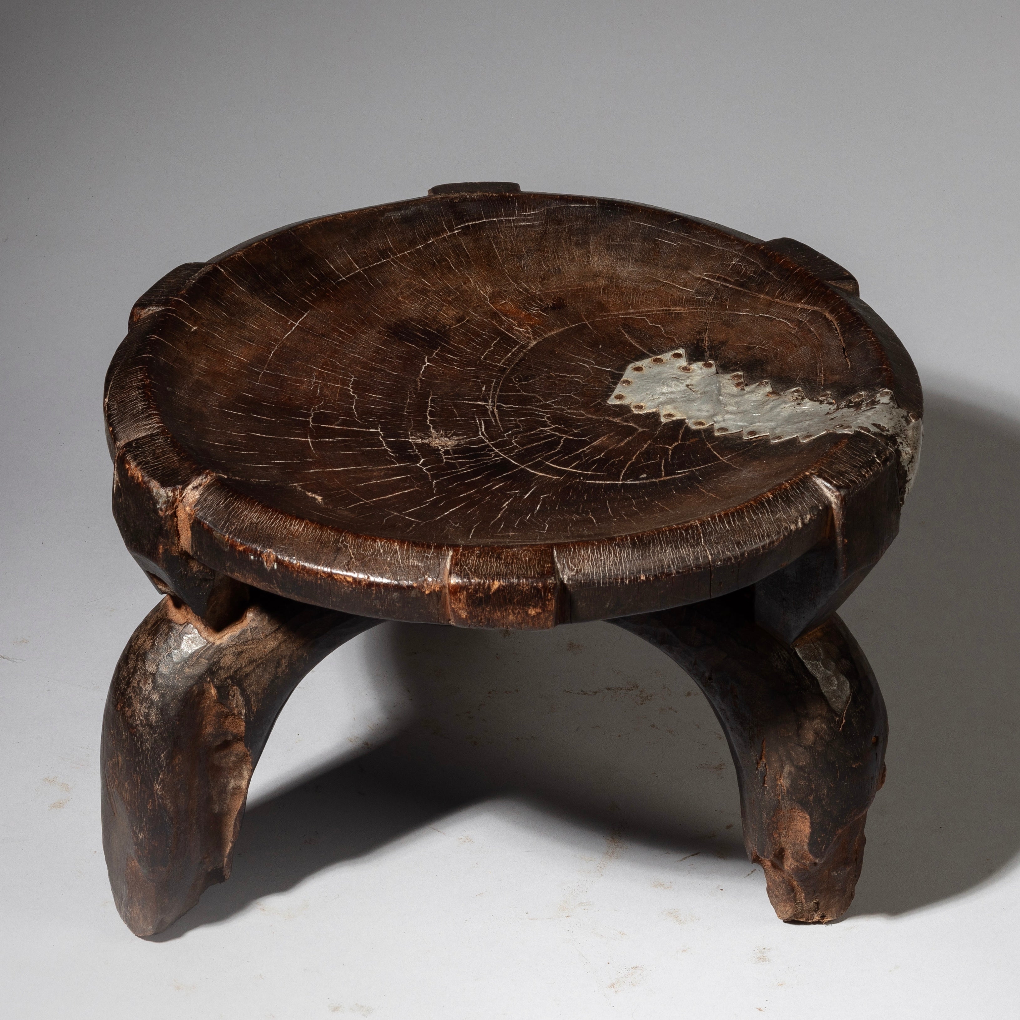 A CHARACTER MEDIUM WOODEN STOOL FROM THE HE HE TRIBE OF TANZANIA  ( No 4238 )