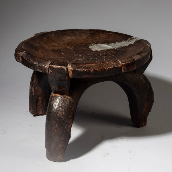 A CHARACTER MEDIUM WOODEN STOOL FROM THE HE HE TRIBE OF TANZANIA  ( No 4238 )