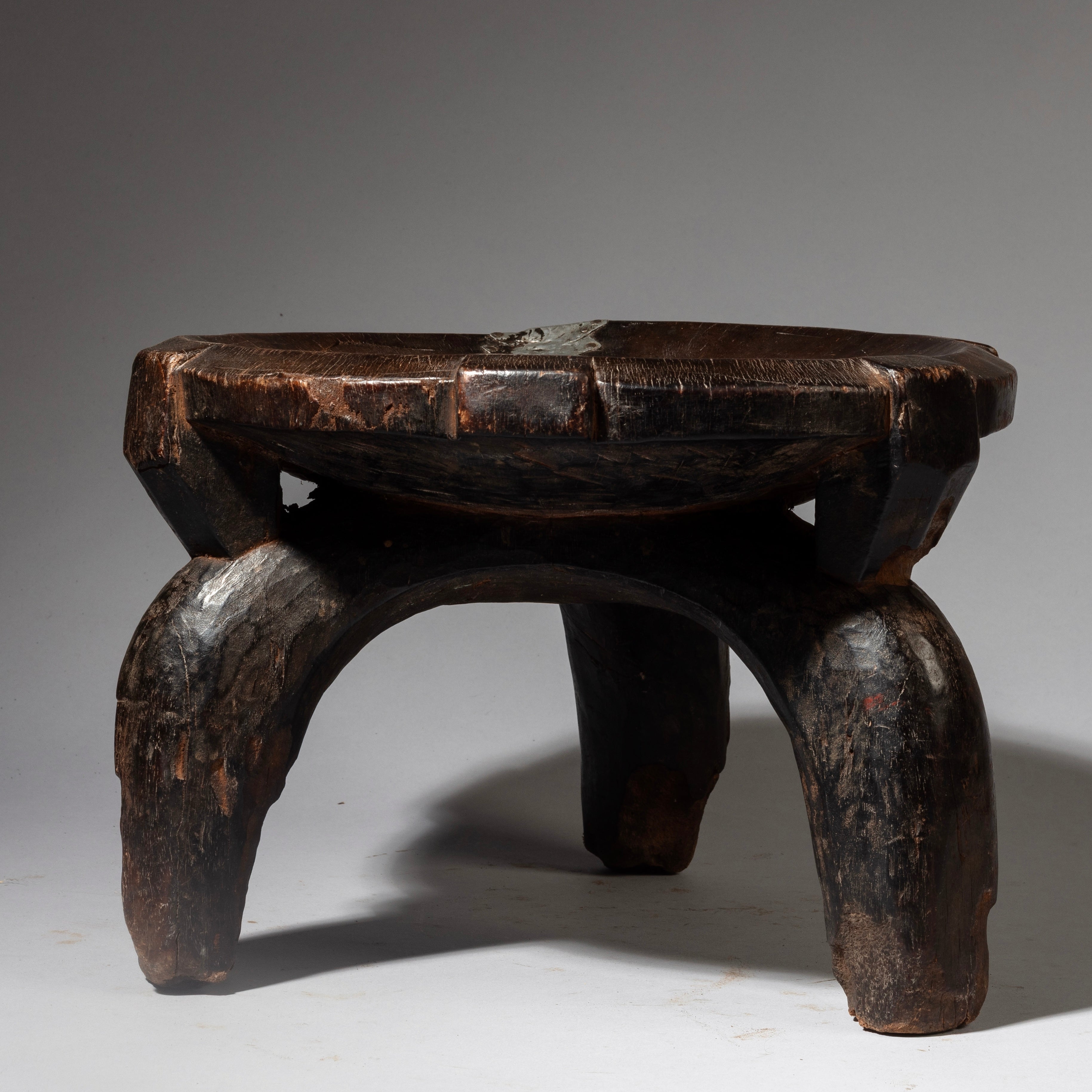 A CHARACTER MEDIUM WOODEN STOOL FROM THE HE HE TRIBE OF TANZANIA  ( No 4238 )