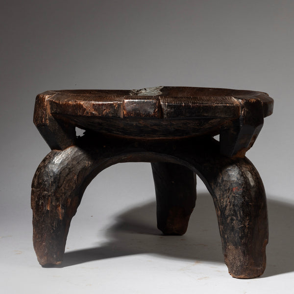 A CHARACTER MEDIUM WOODEN STOOL FROM THE HE HE TRIBE OF TANZANIA  ( No 4238 )