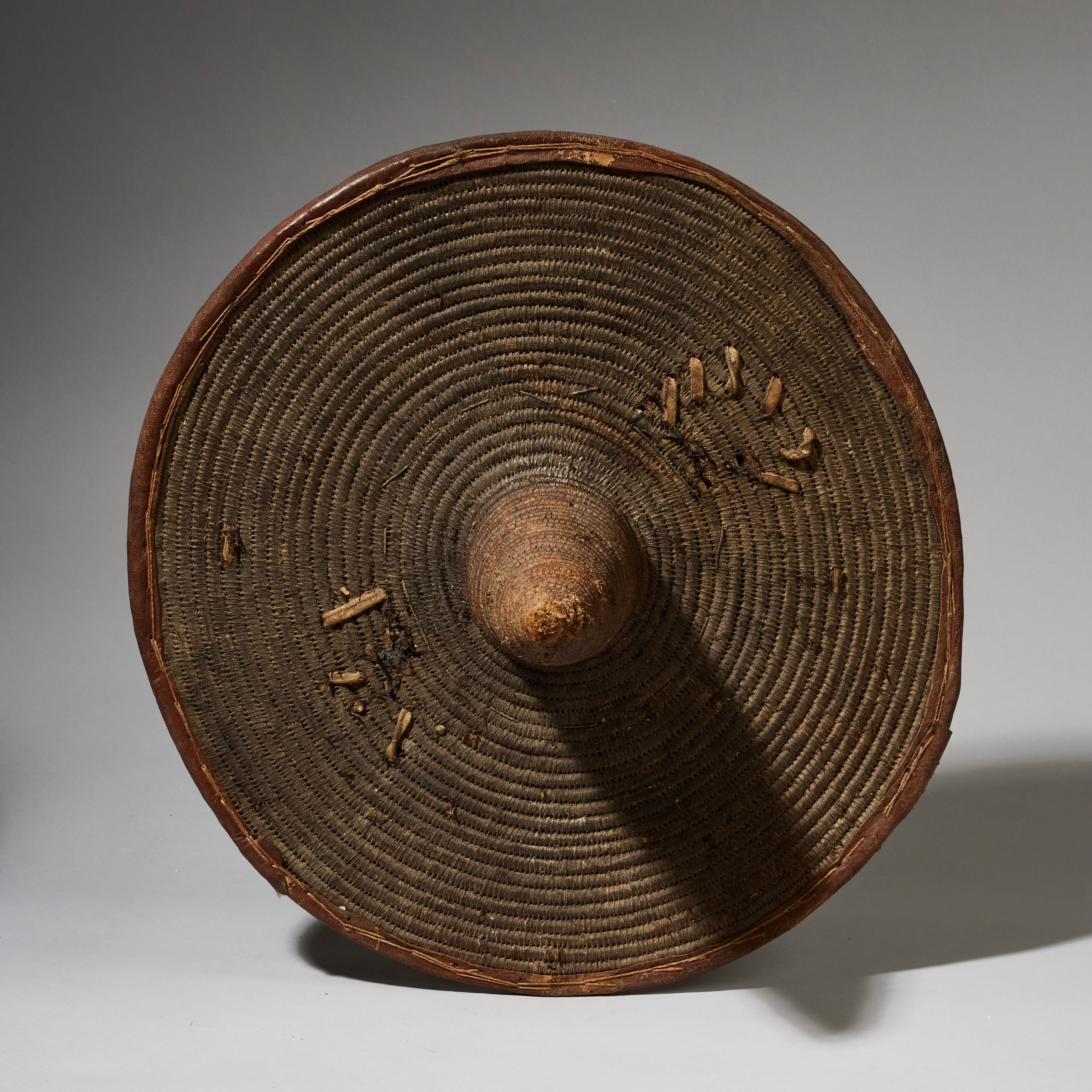 A CIRCULAR WOVEN FIBRE SHIELD, SOMBA TRIBE NORTHERN TOGO, WEST AFRICA (No 2851