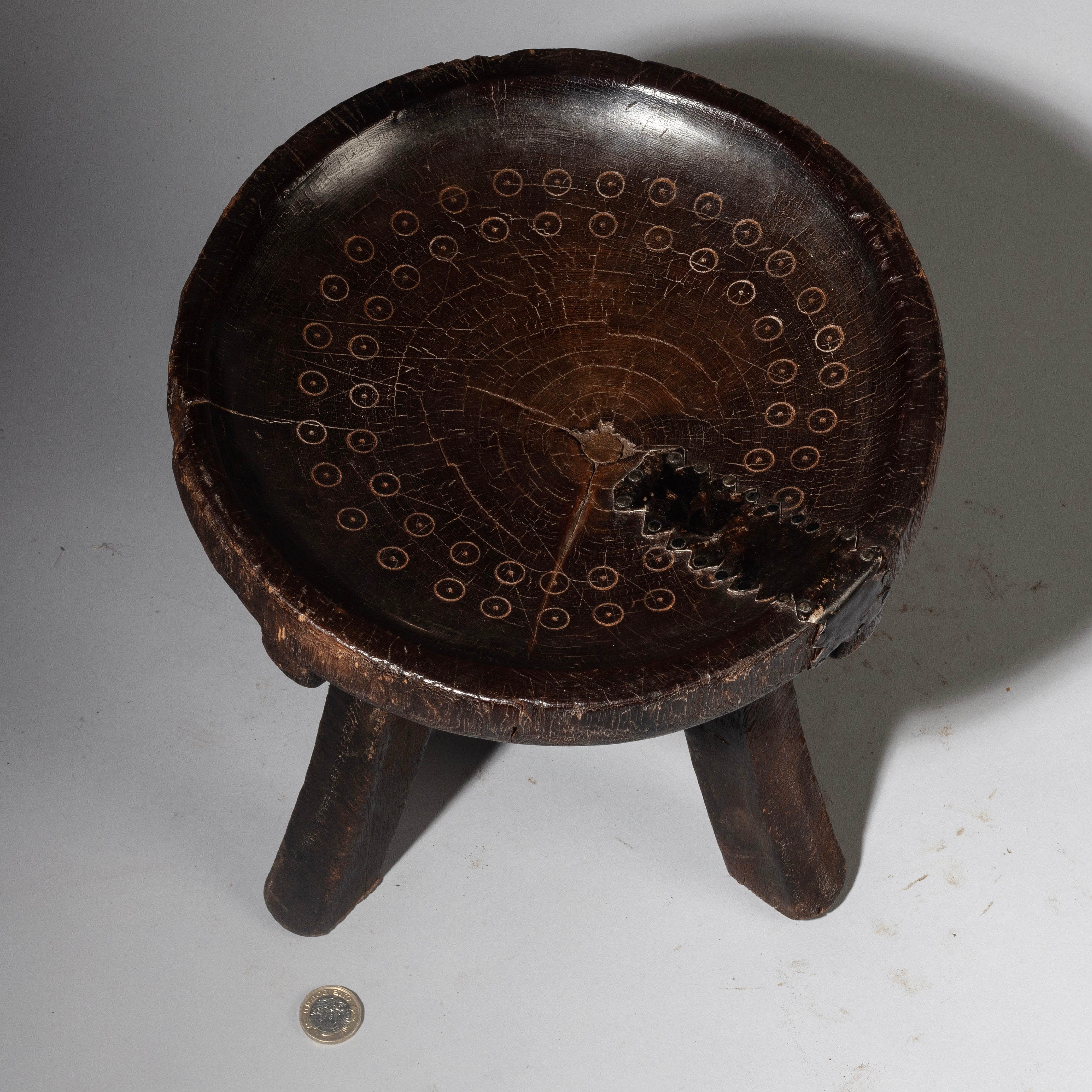 Sold A SIMPLE WOODEN STOOL FROM THE HE HE TRIBE OF TANZANIA ( No 4237 )