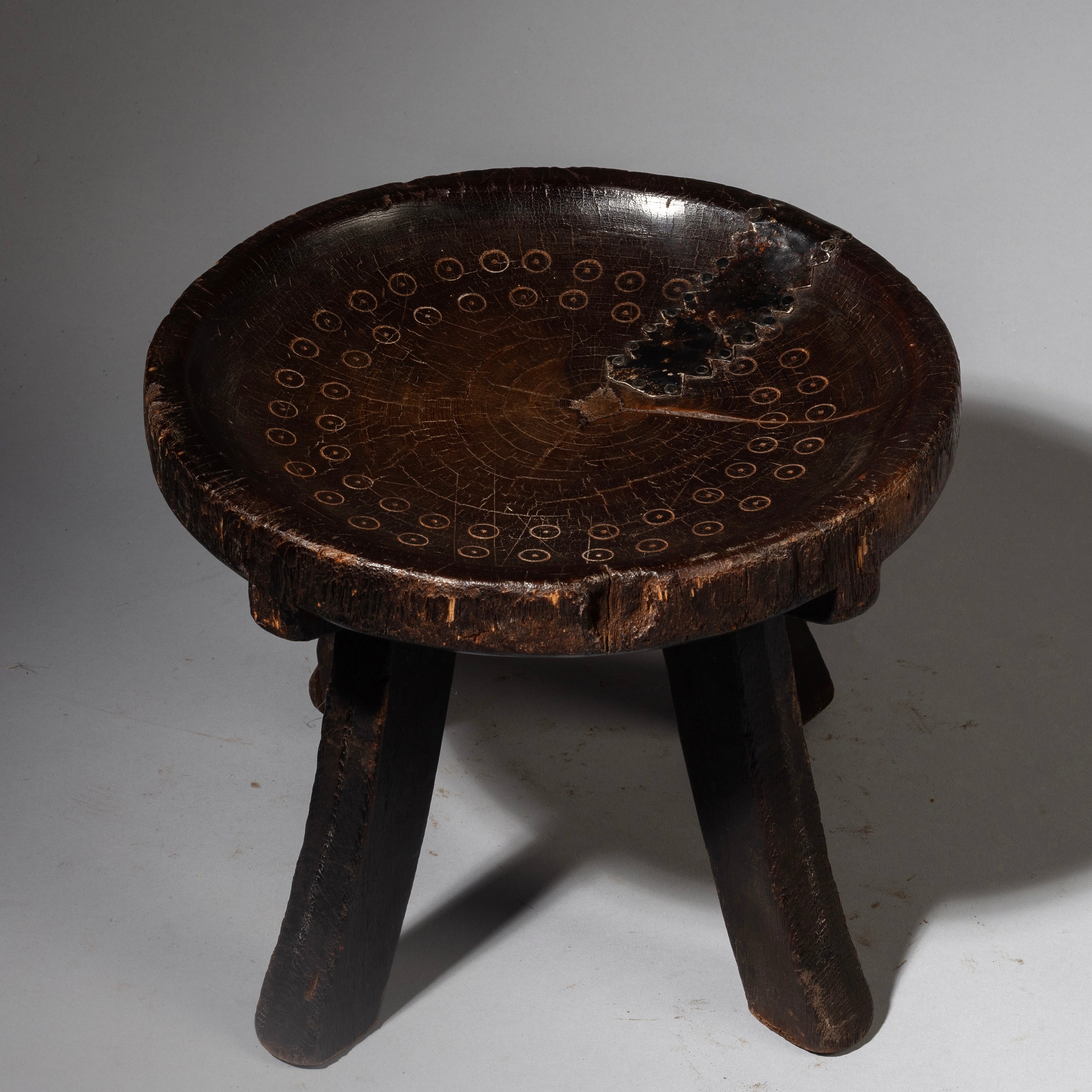 Sold A SIMPLE WOODEN STOOL FROM THE HE HE TRIBE OF TANZANIA ( No 4237 )