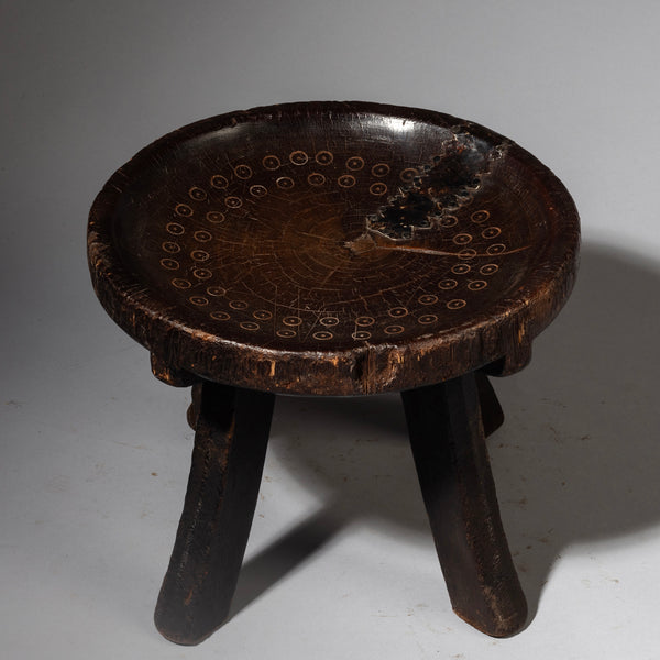 Sold A SIMPLE WOODEN STOOL FROM THE HE HE TRIBE OF TANZANIA ( No 4237 )