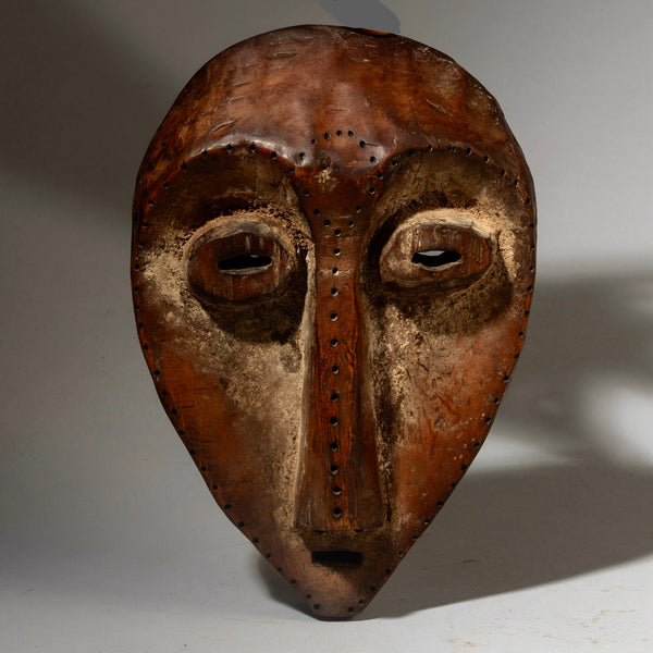 A NICELY PATINATED LEGA TRIBE MASK FROM CONGO [ No 4311]