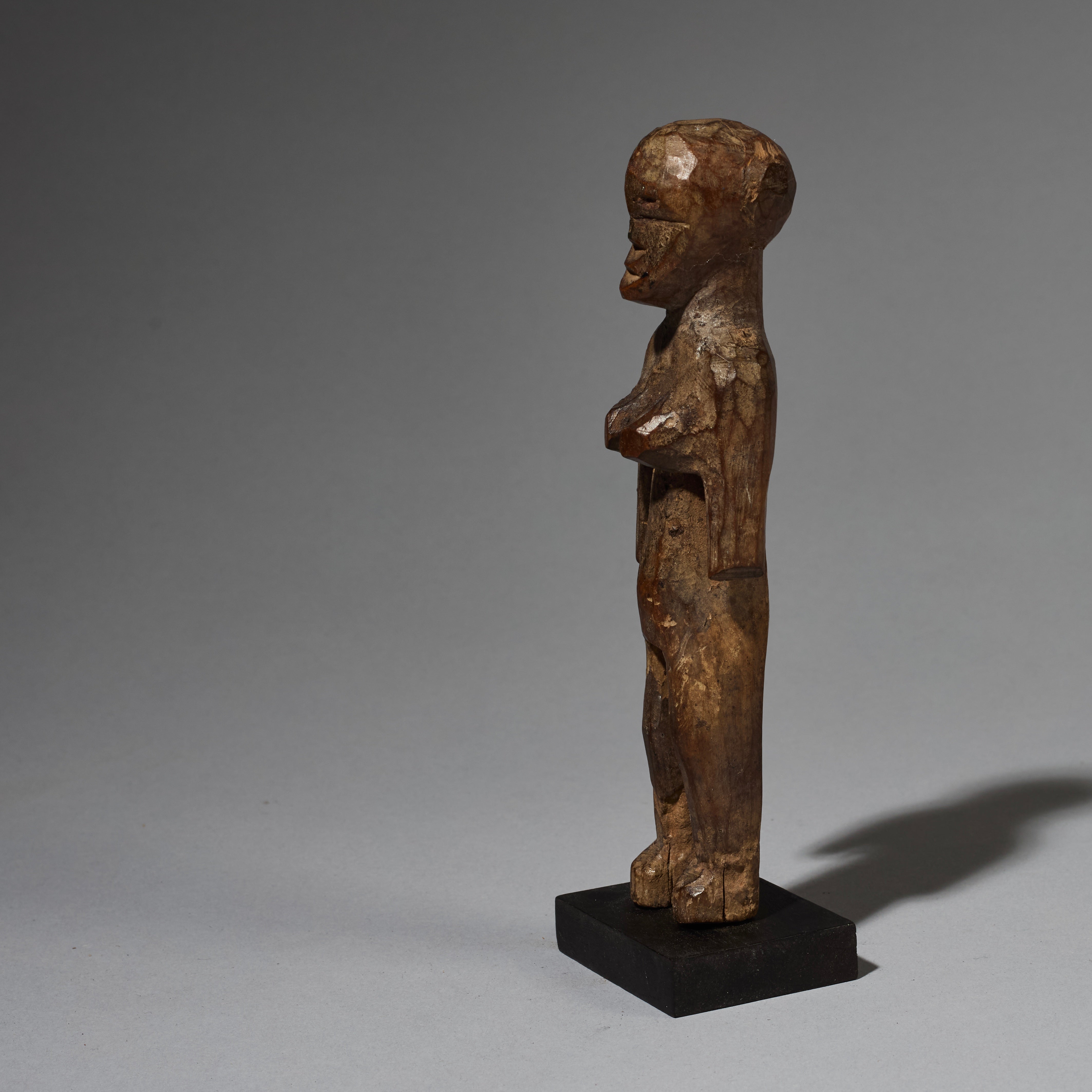 A WELL PATINATED ANCESTOR FIGURE, ADAN TRIBE OF GHANA ( No 2692)