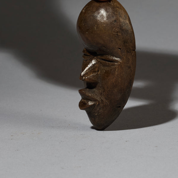 AN EXPRESSIVE DAN PASSPORT MASK FROM THE IVORY COAST ( No 2748)