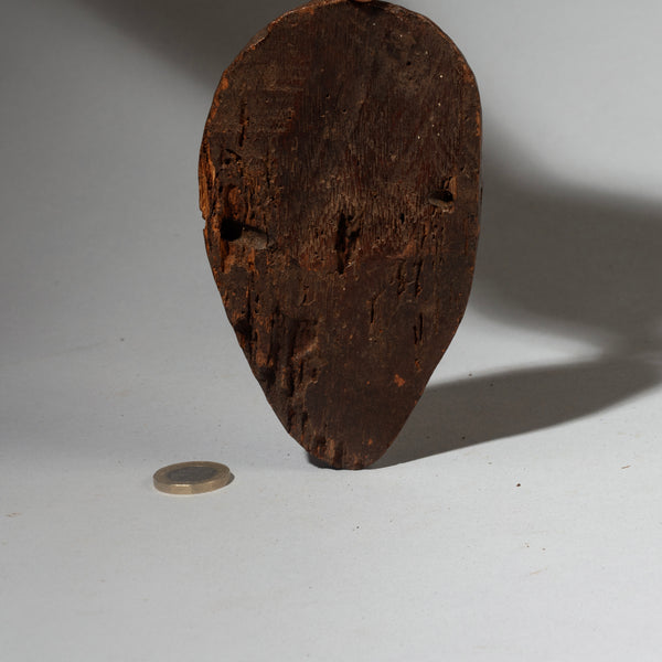 A PRECISE PASSPORT MASK WITH REMNANTS OF PIGMENT , LEGA TRIBE CONGO ( No 4267 )
