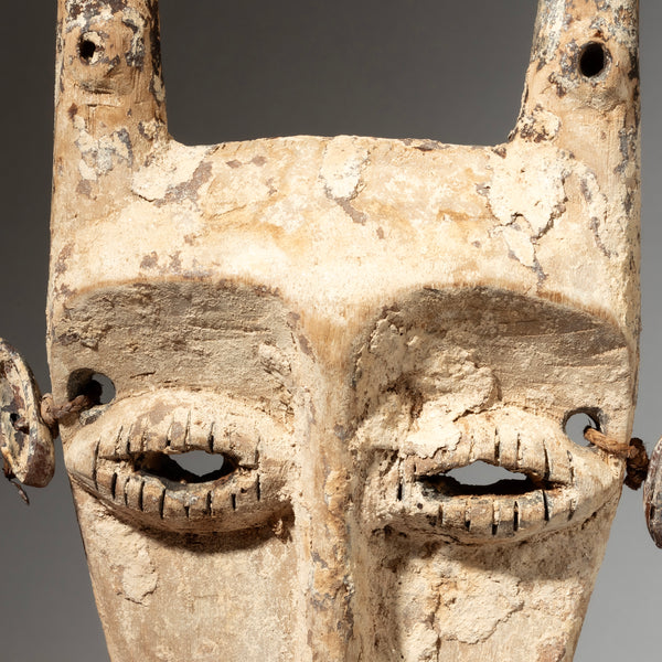 A STRIKING  “IDIMU” KAOLIN ENCRUSTED LEGA TRIBE MASK ( No 4244 )